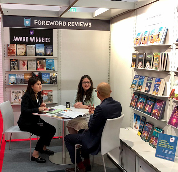 Guests at the Foreword Reviews Booth